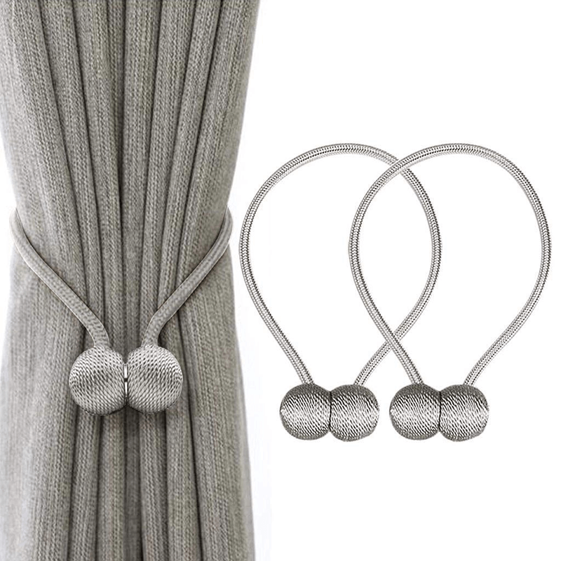 Magnetic curtain tiebacks