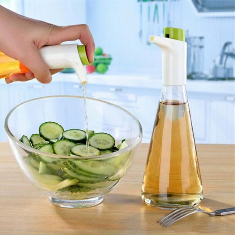 Oil - vinegar cruet set with adjustable flow control - green