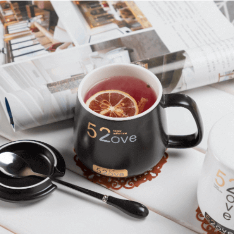 Ceramic mug with lid and spoon
